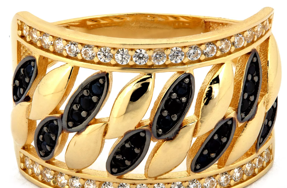 Zlatý prsteň so zirkónmi v listovom vzore spája eleganciu a originalitu – dokonalý doplnok pre výnimočné ženy.